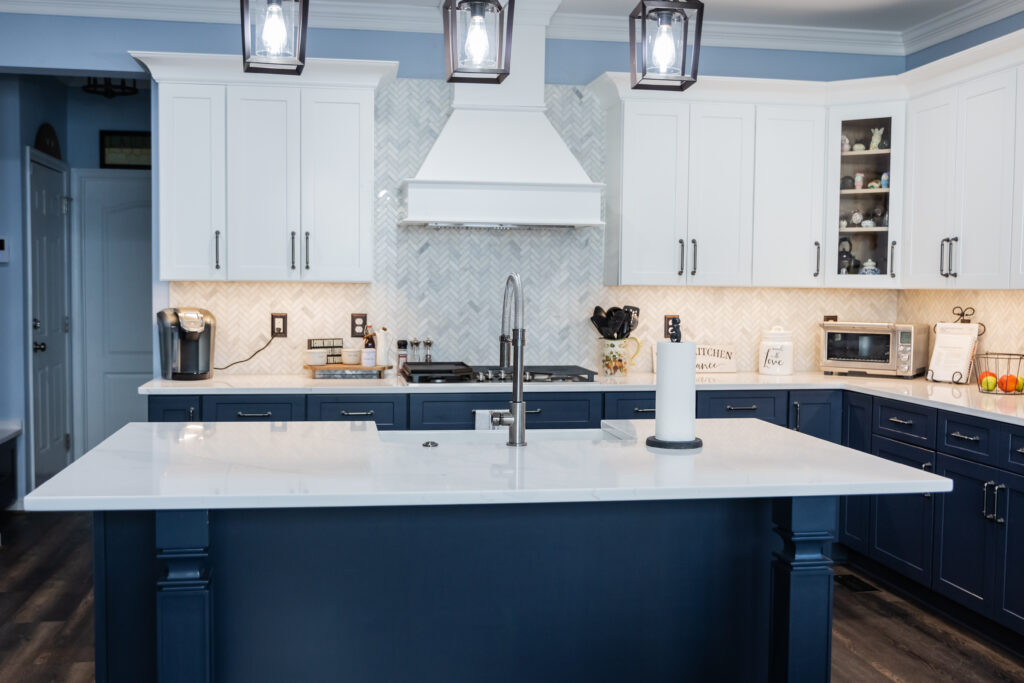 blue kitchen with quartz countertops